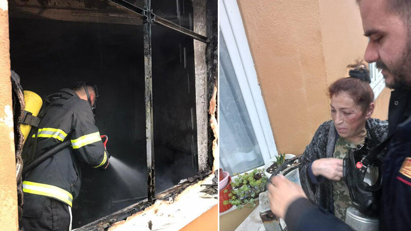 Yangın çıkan evlerinde mahsur kalıp, merdivenle kurtarıldılar